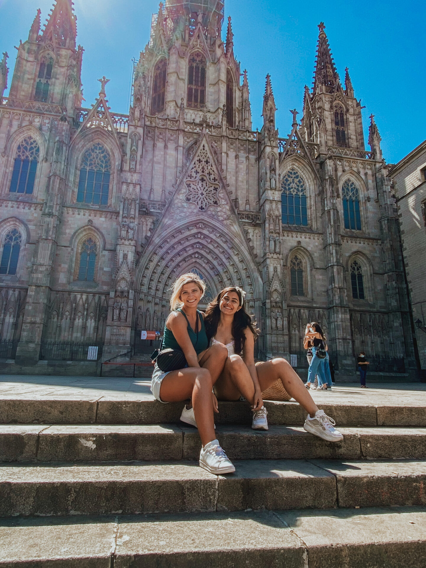 girls in front of barcelona cathedral